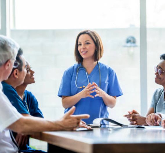nurse presenting to colleagues