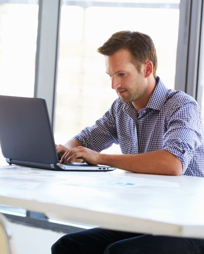 man on computer
